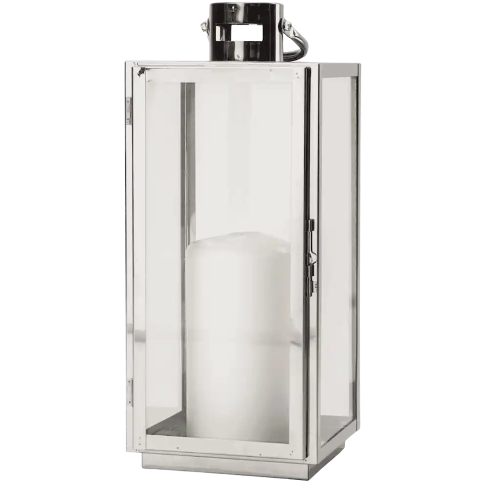 Orrefors Jernverk teräslyhty vasemmalta sivulta, sisällä valkoinen kynttilä – tunnelmallinen joululahja