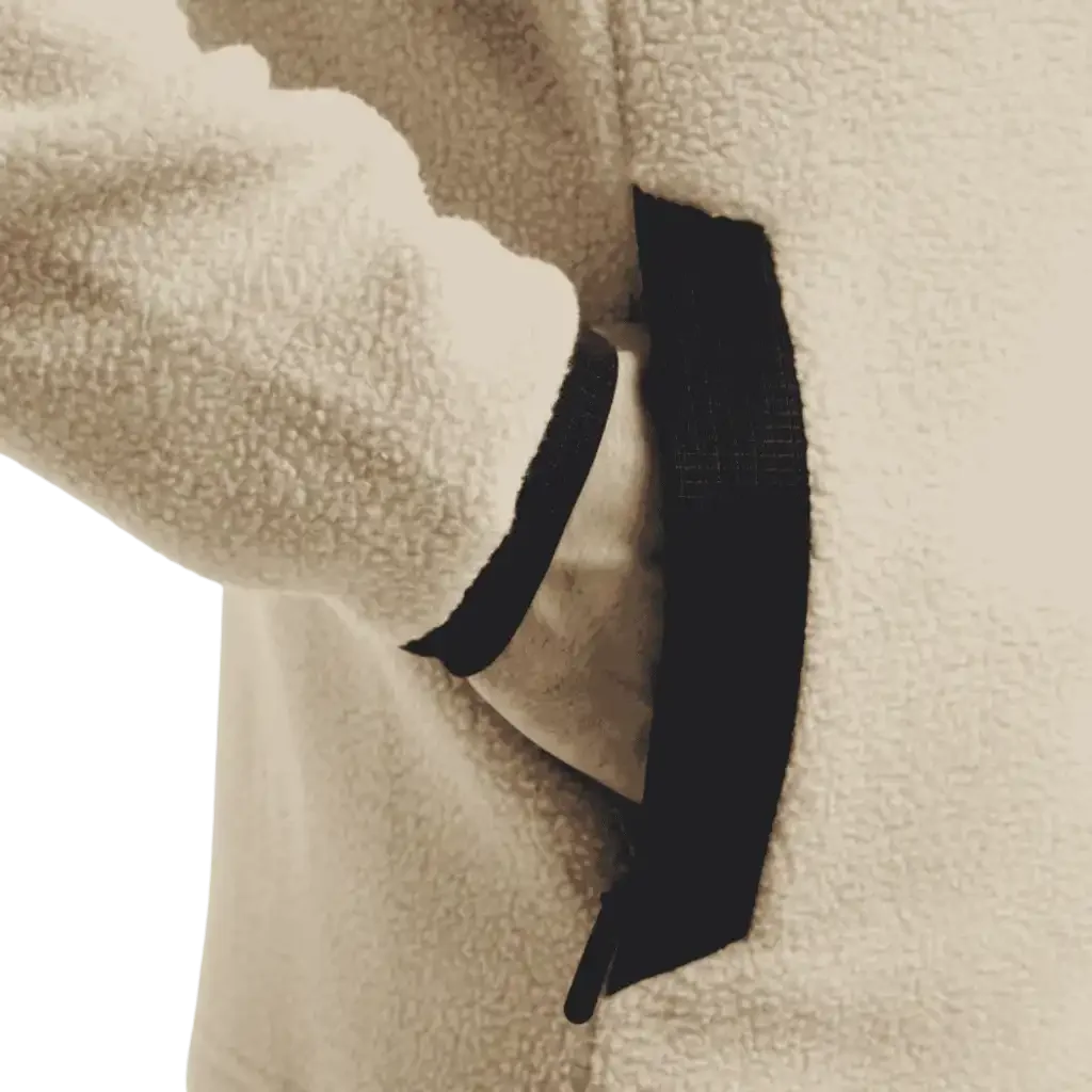 Craft ADV Explore Pile Fleece Jacket M, hihansuu ja vetoketjullinen sivutasku lähikuvassa