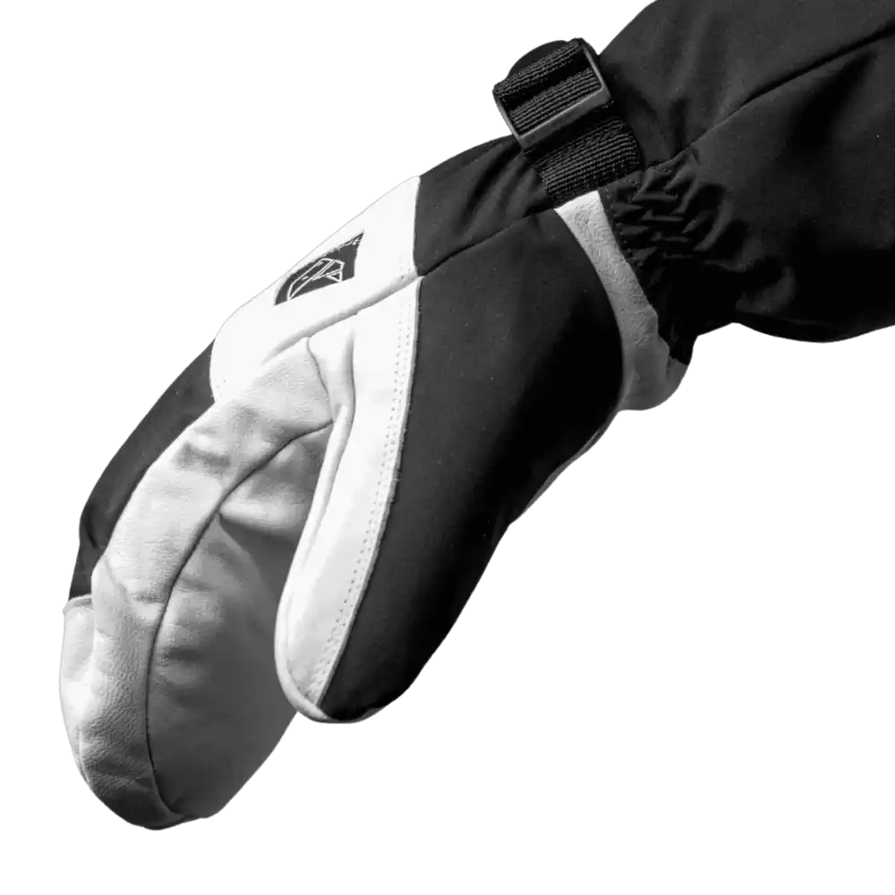 Lähikuva valko-mustista Bright Glove No:2 -kintaista sivulta, näkyvissä MagSnap-yksityiskohta ja rannekiristys