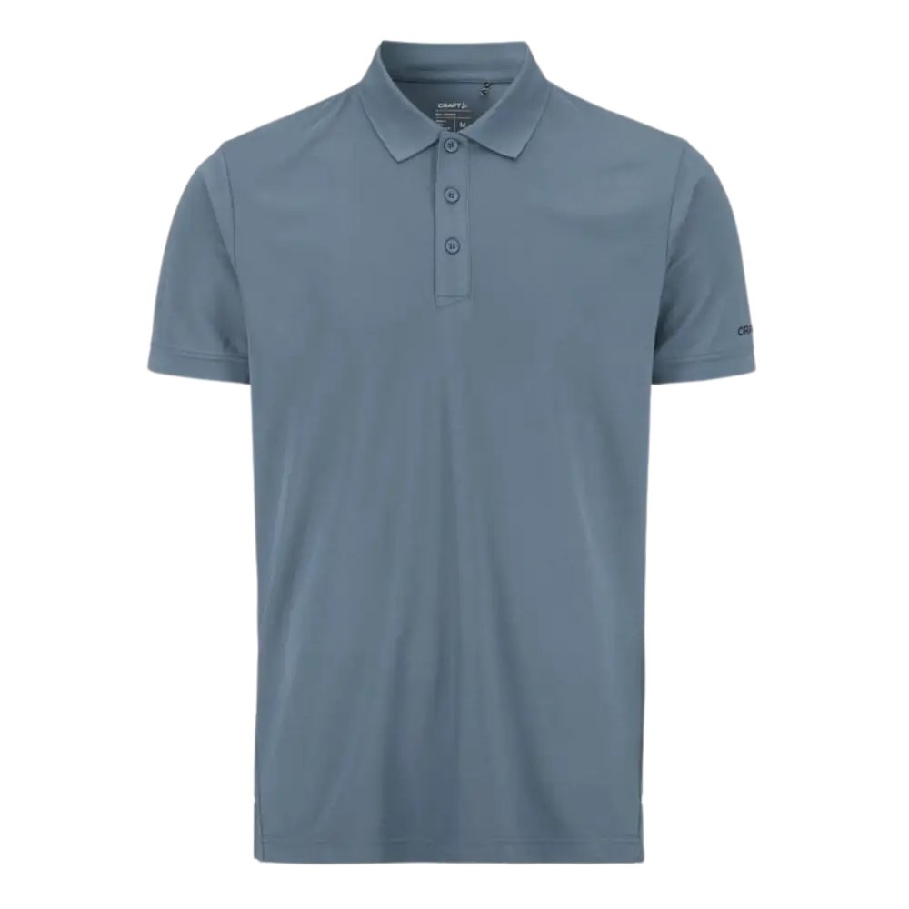 Craft CORE Unify Polo, vÀri Prune (tumma luumu/violetti). Pikee yrityksen logolla, kuva edestÀ.