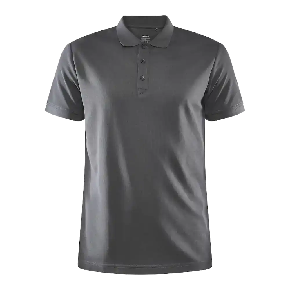 Craft CORE Unify Polo pikee, väri Granite (tummanharmaa). Pikee yrityksen logolla, kuva edestä.