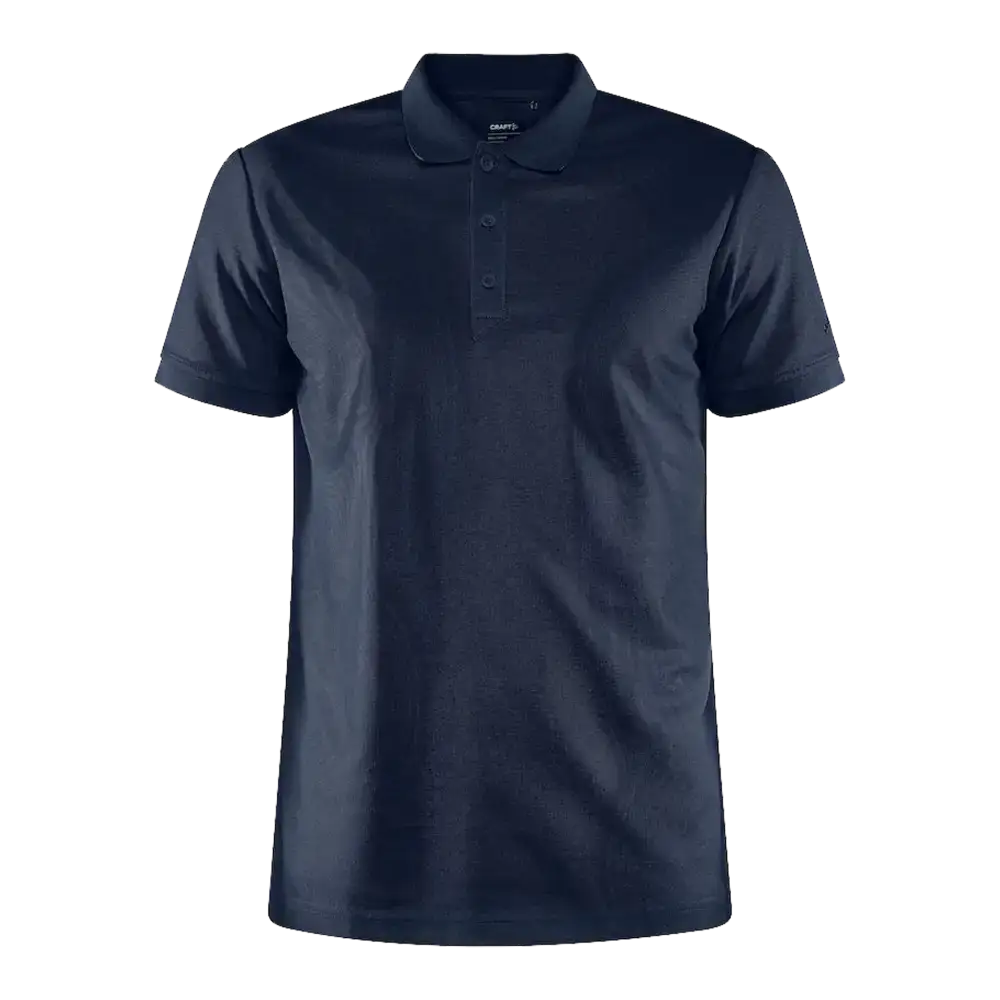 Tumma laivastonsininen Craft CORE Unify Polo pikeepaita. Pikee yrityksen logolla, kuva edestÀ.