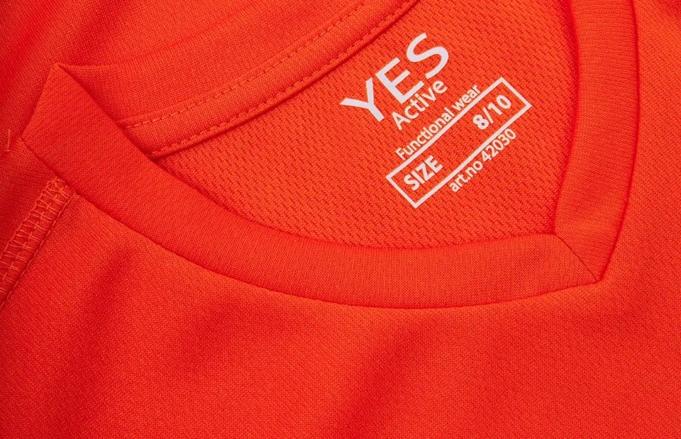 ID YES Active 42030 lasten tekninen T-paita – oranssi, yksityiskohta