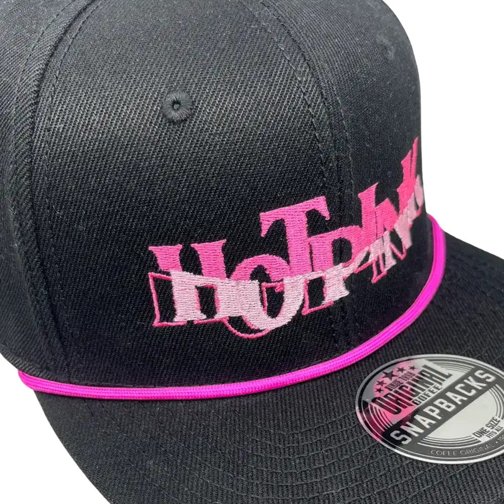 Snapback-lippis lisätyllä rope-koristenarulla