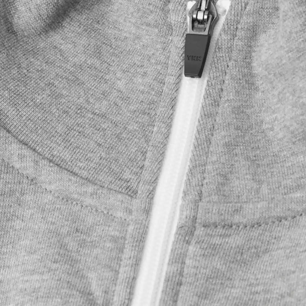 Grey melange collegetakki omalla logolla â lĂ€hikuva kauluksesta ja vetoketjusta