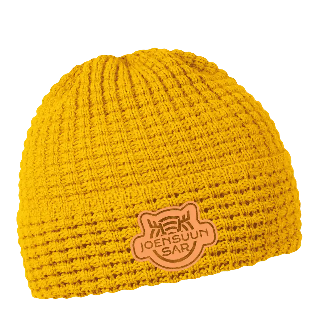 Cube pipo mustard omalla nahkamerkki logolla.