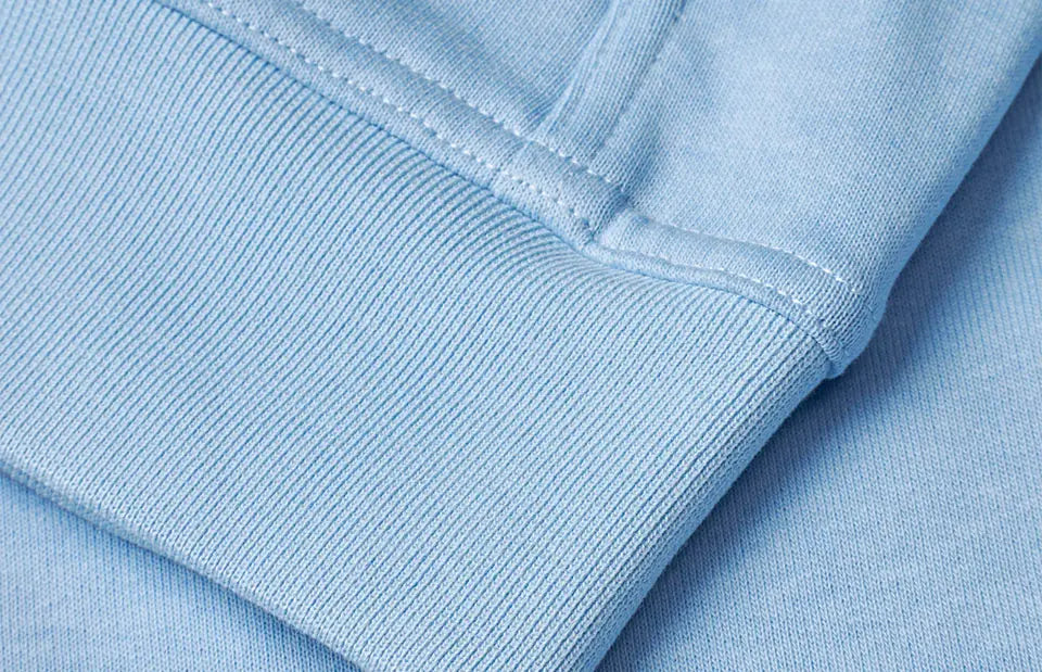 ID PRO Wear CARE 0388 miesten vetoketjuhuppari, vaaleansininen, hihansuun ja tikkauksen yksityiskohta