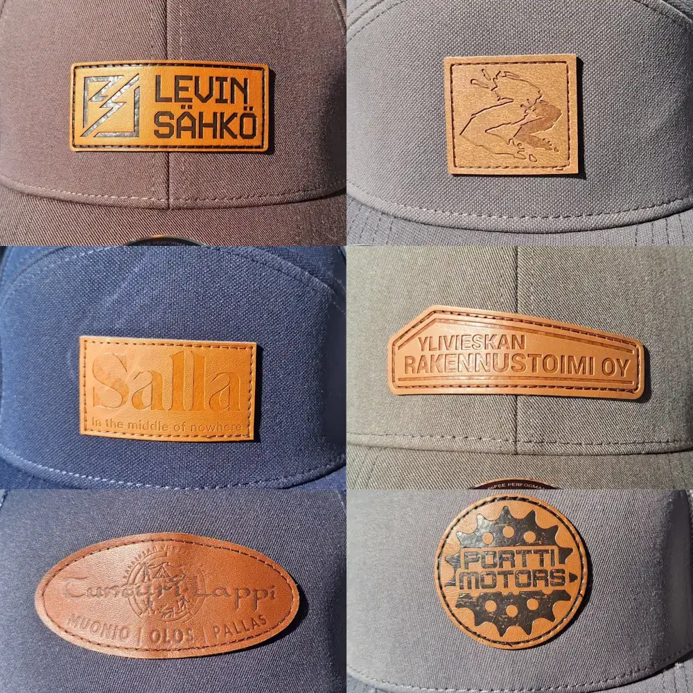 Lähikuvassa 6 eri nahkamerkki mallia lippis omalla logolla. Avuksi oman logo lippalakin suunnitteluun.